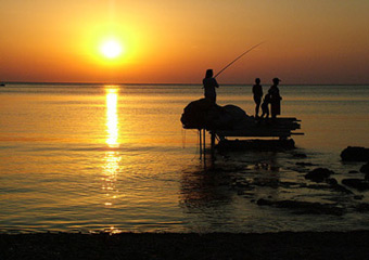 skyros beach - fishing at sunset